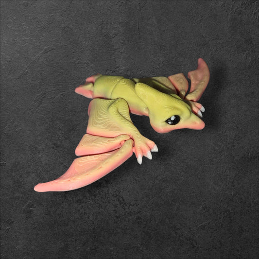 3D printed chibi T-rex articulated dinosaur figure in bright colors