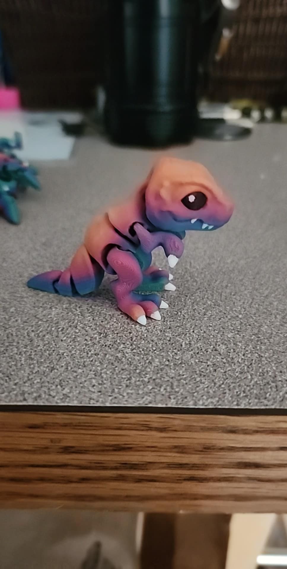 3D printed chibi T-rex articulated dinosaur figure in bright colors