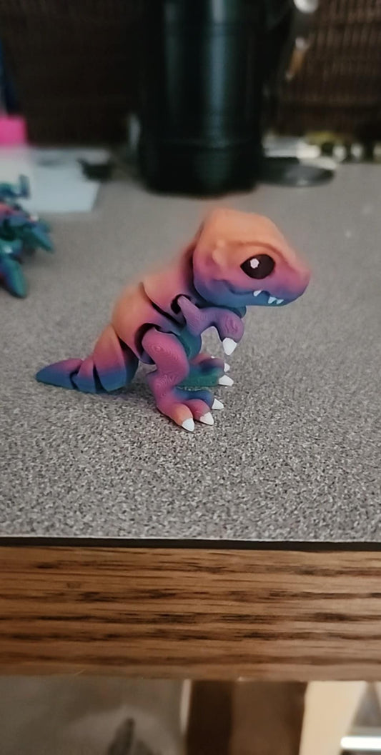 3D printed chibi T-rex articulated dinosaur figure in bright colors