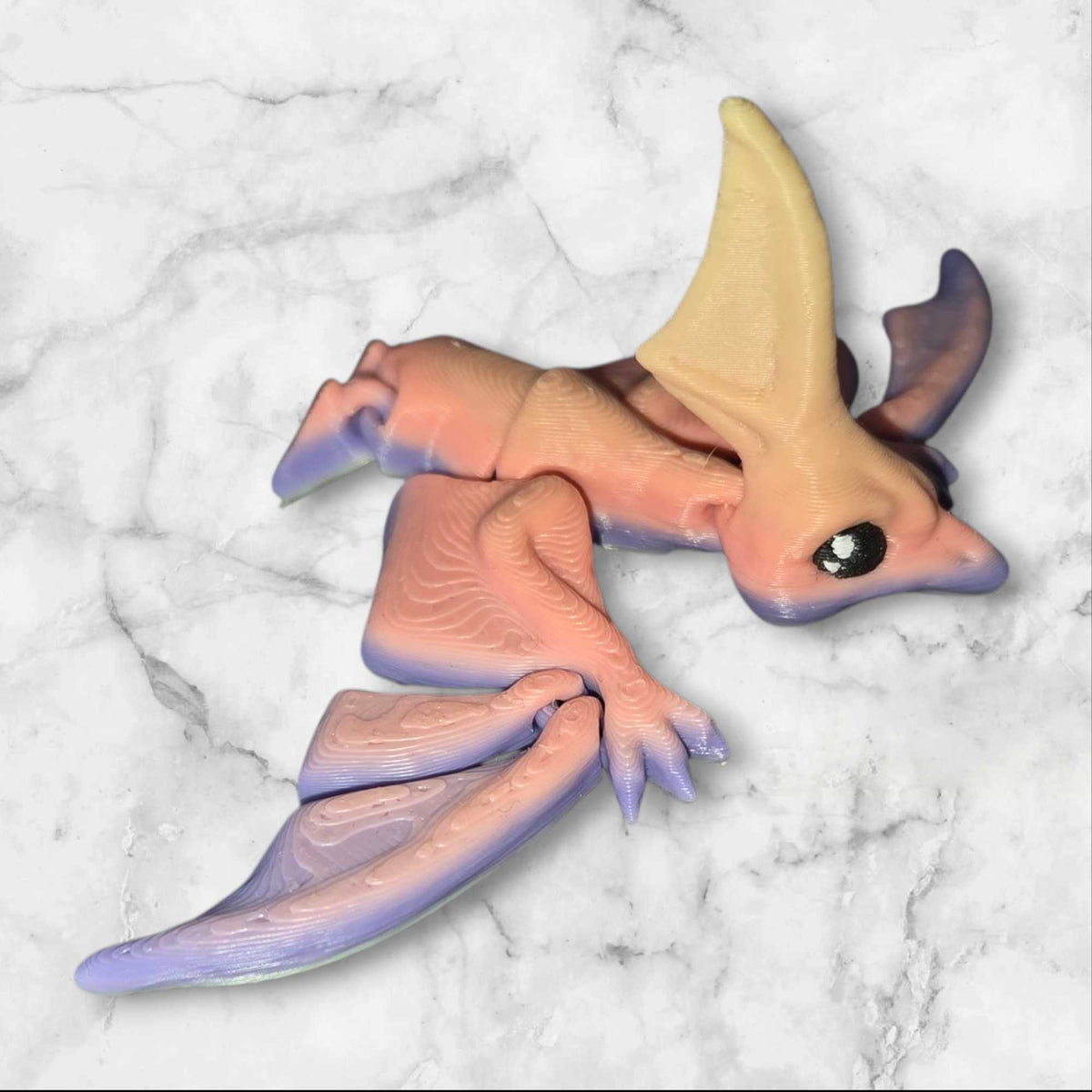 3D printed chibi T-rex articulated dinosaur figure in bright colors